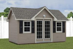 Custom Home Office Building from Pine Creek Structures | Victorian style shed with vinyl siding and custom upgrades