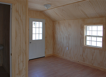 Custom Vinyl Cape Cod Style Home Office Building with Finished Interior built by Pine Creek Structures