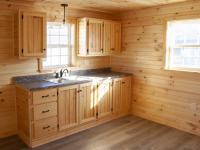 12x36 Custom Peak Cabin with Finished Interior (Kitchen Area with cabinets and sink)