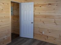 12x36 Custom Peak Cabin with Finished Interior (bedroom with closet)