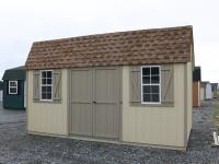 Pine Creek 10x16 HD Dutch Barn with Beige walls, PC Clay trim and PC Clay shutters, and Shakewood shingles