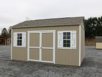 Pine Creek 12x16 HD Peak with PC Clay walls, White trim and White shutters, and Weatherwood shingles