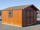 10x16 Front Entry Peak Storage Shed with Redwood Siding from Pine Creek Structures