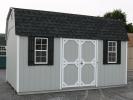 Pine Creek 10x14 HD Dutch Barn with Light Gray walls, White trim and Black shutters, and Charcoal shingles